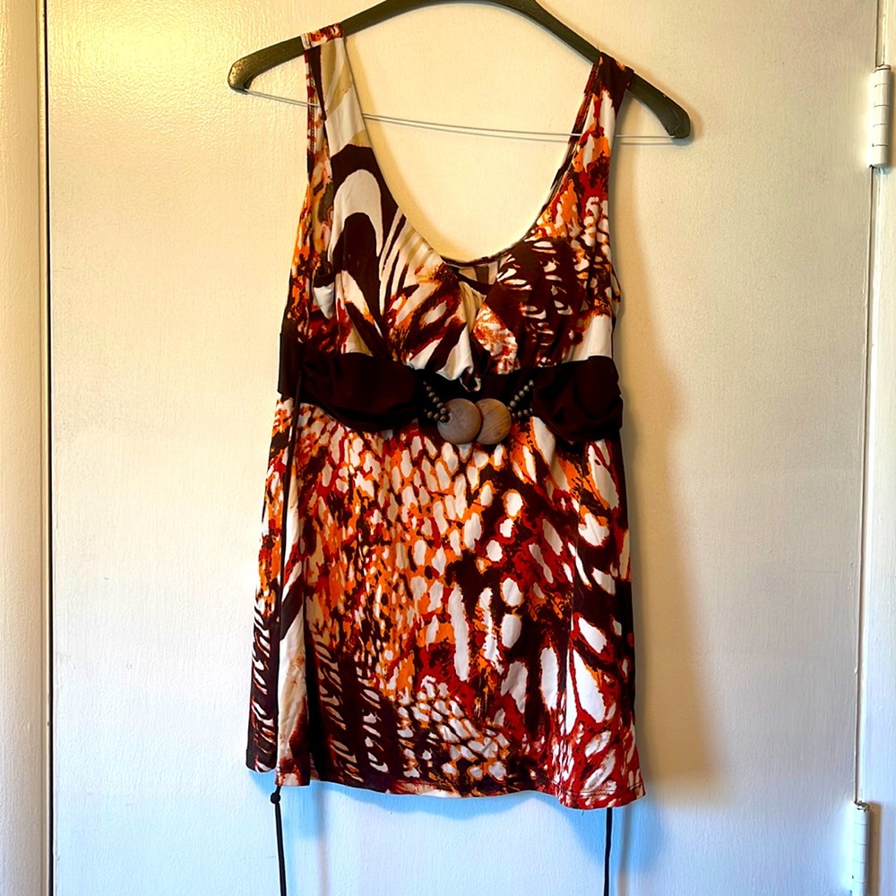 XLarge Wrapper Orange, Brown, Red, and White tank with wood belt accent.